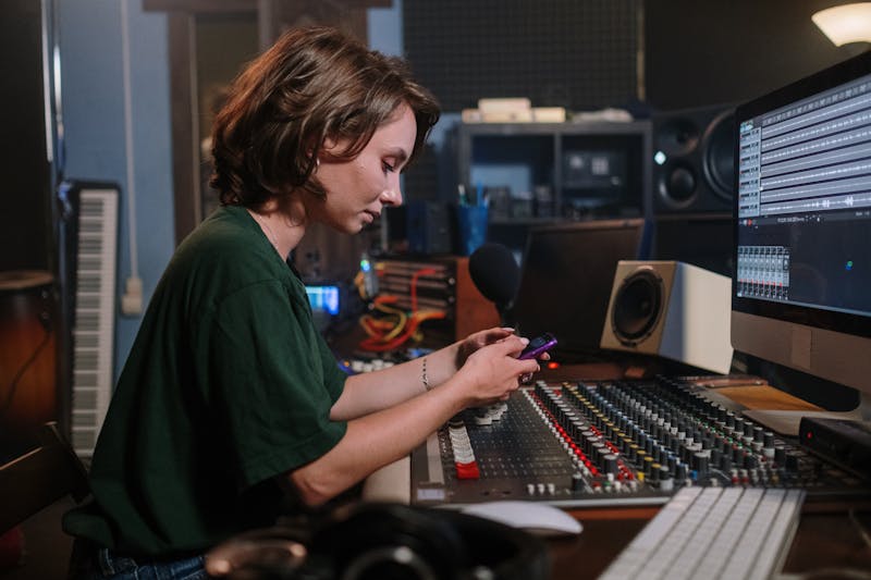 technician using professional lux meter alongside smartphone for calibration verification