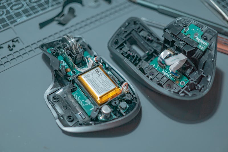 disassembled-smartphone-internal-components-vibration-motor-closeup-water-damage-corrosion-electronics