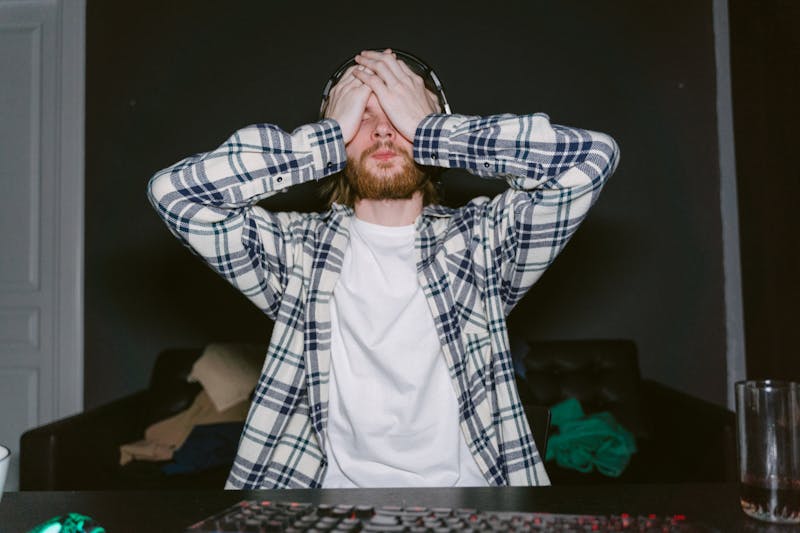 gamer frustration looking at frozen screen, video call buffering icon, digital connection abstract glitch