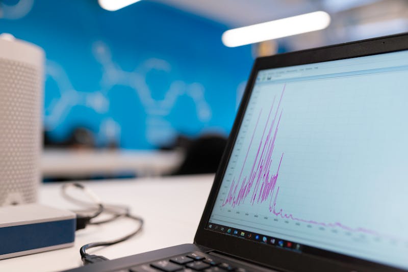 network diagnostics dashboard showing ping test graph, data packets flow visualization